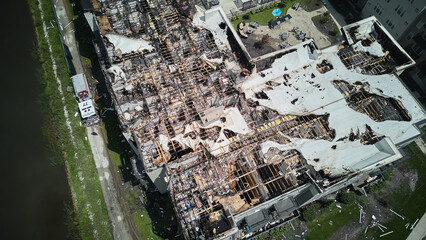  Aerial above shot. Roof of damaged apartment after burned by fire.