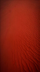 Fototapeta premium Close up of red sand texture background illustration with ripples