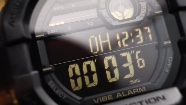 LCD display of a tough sports watch with running timer and stopwatch 