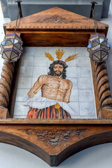 Fototapeta na wymiar Azulejo de Nuestro Padre Jesús del Gran Amor Despojado de sus vestiduras, Almuñécar, Granada, España
