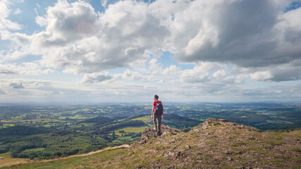 Active solo hike on the peak of Malvern Hills, Worcestershire, United Kingdom.