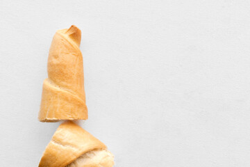 Delicious Salted Breadstick: Crispy Snack on a Clean White Background