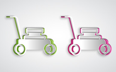 Paper cut Lawn mower icon isolated on grey background. Lawn mower cutting grass. Paper art style. Vector
