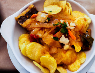 portuguese cod dish with potatoes or bacalhau à Margarida da Praça peppers and onion