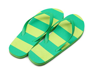 Pair of striped flip-flops in green yellow colours isolated on white backround