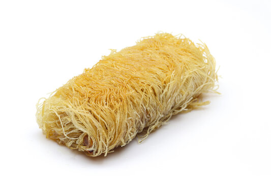 Single turkish delight kadaif finger dessert isolated on white background