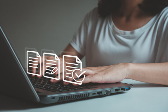 Business performance checklist, businesswoman using laptop doing online checklist survey, filling out digital form checklist, take an assessment, questionnaire, evaluation, online survey, online exam.