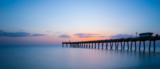 Sunset over the Gulf of Mexico at the Venice Fishing Pier in Venice Florida USA