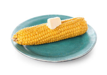 Plate of boiled corn cob with butter on white background