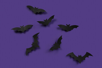 Fototapeta premium Composition with paper bats for Halloween on blue background