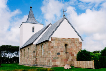 Fototapeta na wymiar A serene vintage Protestant church nestled in the tranquil Danish countryside