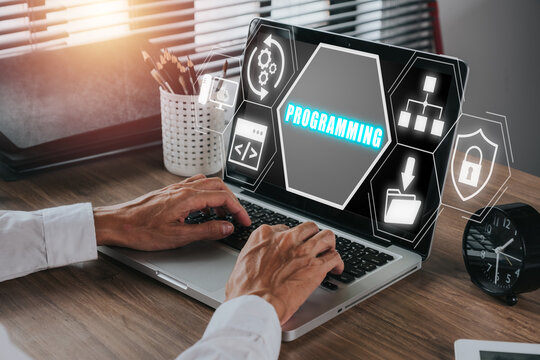 Programming concept, Person hand typing keyboard computer on desk workplace with programming icon on virtual screen.