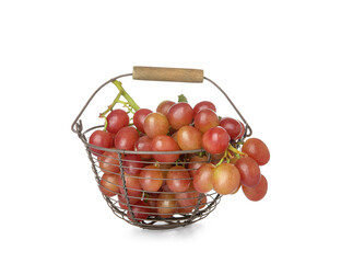 Basket with tasty ripe grapes on white background