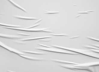 Obraz premium White blank crumpled and creased paper poster texture background