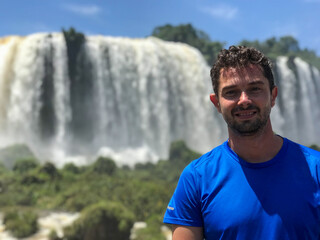 Brazilian man tourist in the Iguassu Falls.