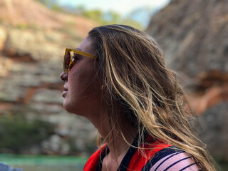 Brazilian woman tourist in Piranhas, Alagoas, Brazil. By boat on the Sao Fransico River.