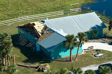 Hurricane Ian destroyed house in Florida residential area. Natural disaster and its consequences