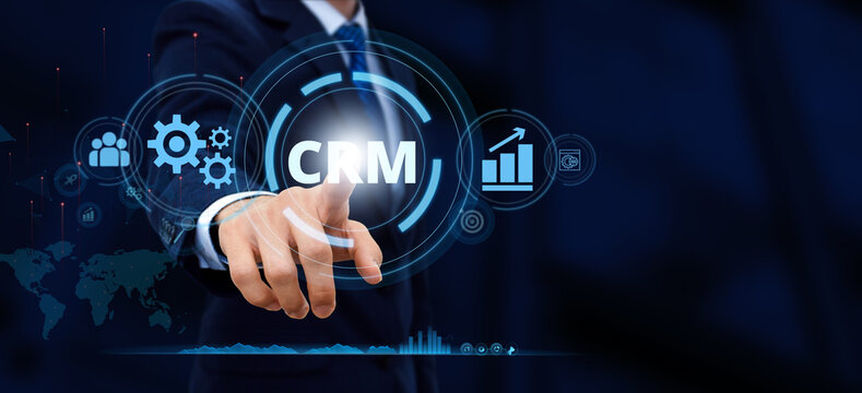 CRM Customer relationship management concept with businessman touching icon