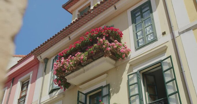 Handheld shot of the exterior of a beautiful house in Gijon, Asturias - Slow Motion