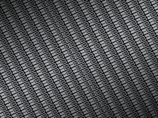 Black metal texture steel background. Perforated metal sheet.