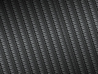 Black metal texture steel background. Perforated metal sheet.