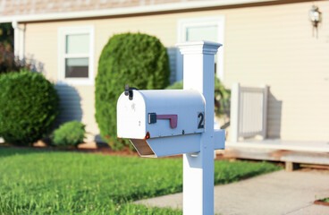 Home mailbox: A symbol of connection, awaiting news and messages. Reflects a sense of belonging and communication in one's personal space