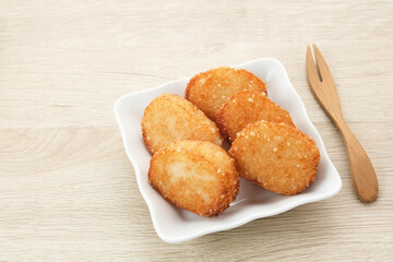Jadah Goreng or Fried sticky rice cake, made from glutinous rice and grated coconut. Indonesian snack

