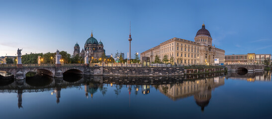Panorama of the Berlin Cathedral, the famous TV Tower and the rebuilt City Palace at twilight