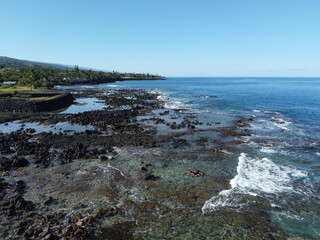 Waves hitting the beach in Maui, Hawaii