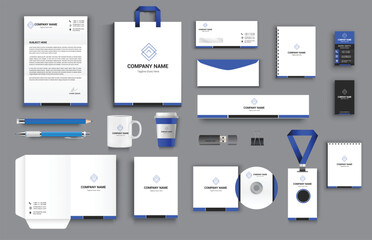 office business stationary set in blue black white color vector design with letter head envelop folder id card notepad dvd cover usb paper clip pen pencil cups business card shopper