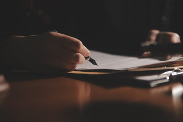 Business and lawyers discussing contract papers with brass scale on desk in office. Law, legal...