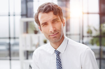 close-up of the face of a confident businessman in the office