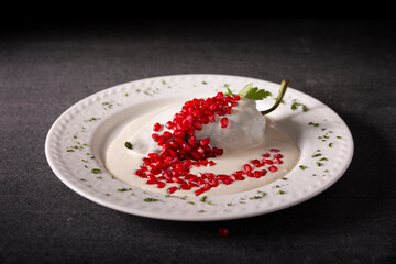 Chile en Nogada, Typical dish from Mexico. Prepared with poblano chili stuffed with meat and fruits and covered with a walnut sauce. Named as the quintessential Mexican dish for national holidays.