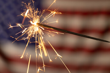 Sparkler with copy space on flag of usa background