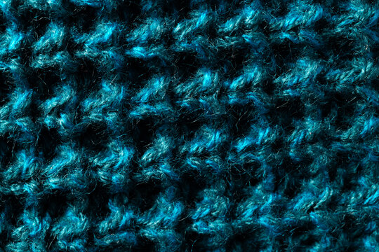 Fototapeta Micro close up of blue wooly crochet fabric with copy space