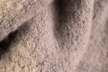 Micro close up of grey fluffy fabric with copy space