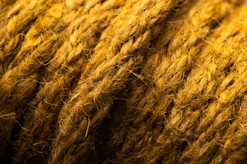 Micro close up of yellow wool threads with copy space