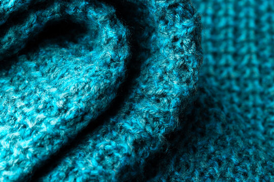 Fototapeta Micro close up of blue crocheted woolly fabric with copy space