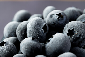 Micro of blueberries with copy space on black background