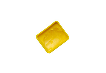 yellow butter or margarine in square package on transparent background