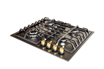 Modern gas hob stove made of steel and cast iron with golden controls using natural gas or propane...