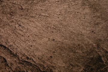 brown stone floor with stripes
