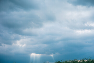Dark blue sky with white clouds background blue cloud texture Dark blue sky wallpaper with full white clouds and sunlight.