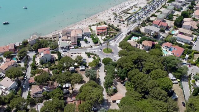 Beach revealing Drone tilt shot at Saint Cyr sur mer at the Mediterranean.