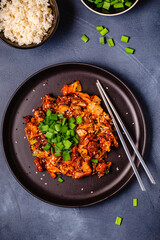 Fried kimchi with pork onions and spices. Traditional Korean food