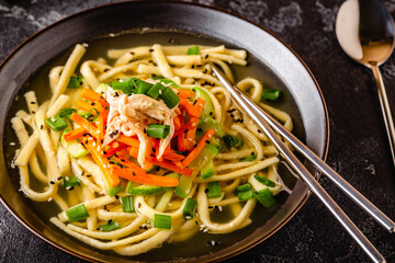 Traditional Korean chicken soup with homemade noodles