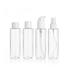 Group of PET cosmetic transparent bottles isolated on white background with disc top cap, flip cap,...