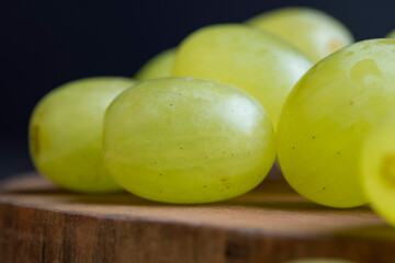 Green-yellow grapes grown in a home vineyard