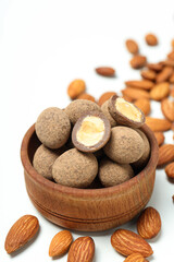 Tasty and sweet food - almonds in chocolate