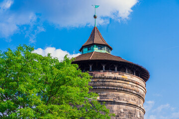 Exterior view of the Frauentorturm, fortified medieval tower in Nuremberg Old Town District, Germany